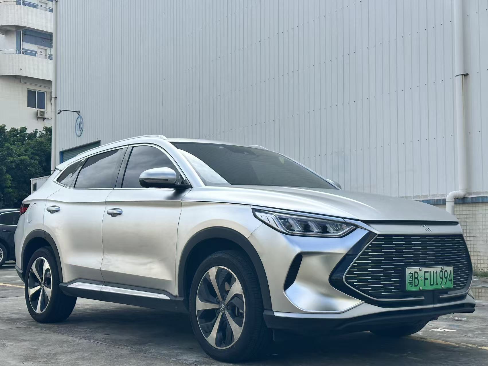BYD Song PLUS DM-i 2021 - Rear passenger door open, interior view