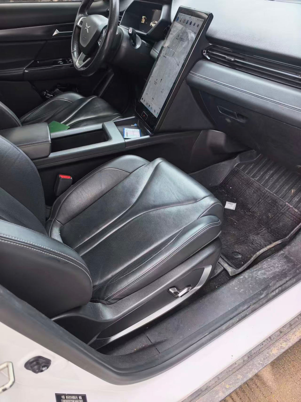 Xpeng G3 front passenger seat and center console interior view