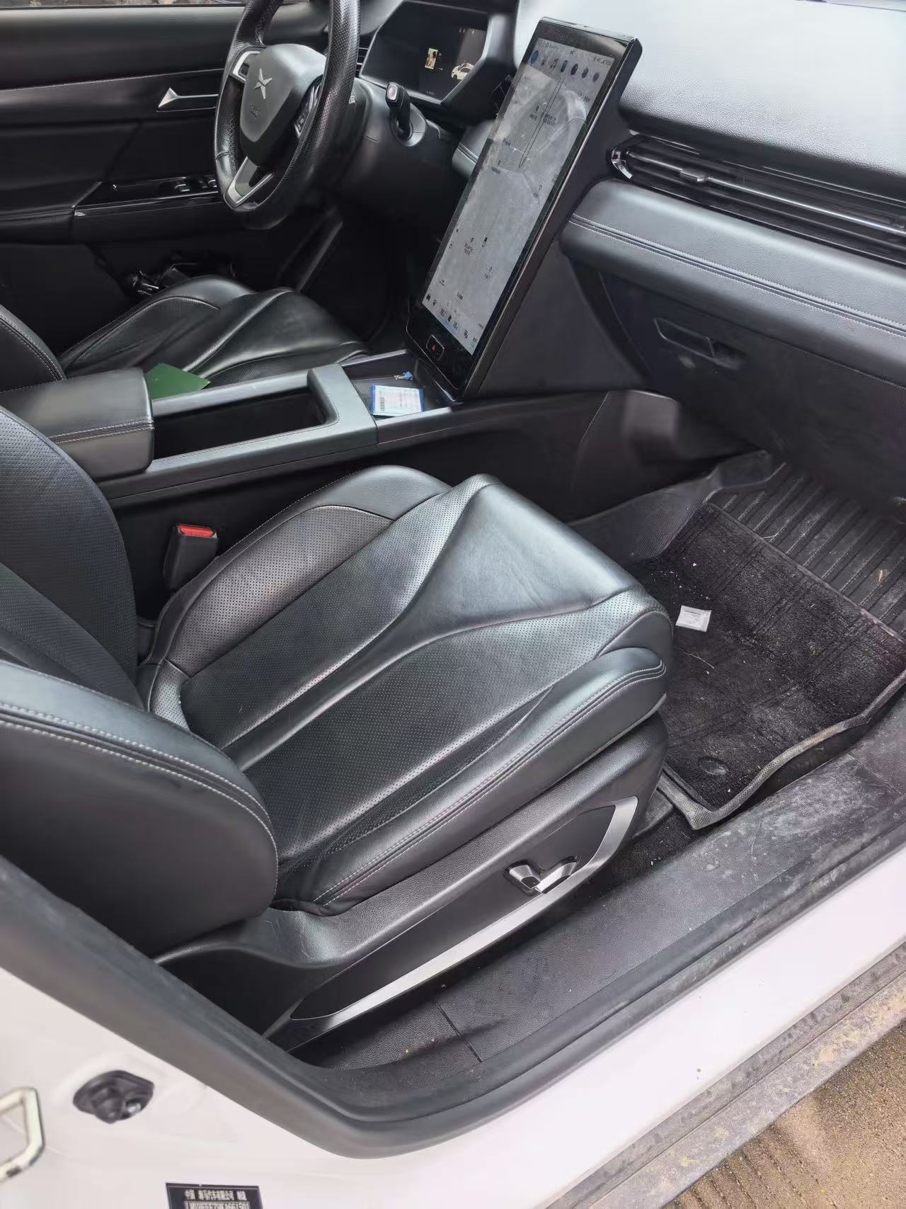 Xpeng G3 front passenger seat and center console interior view