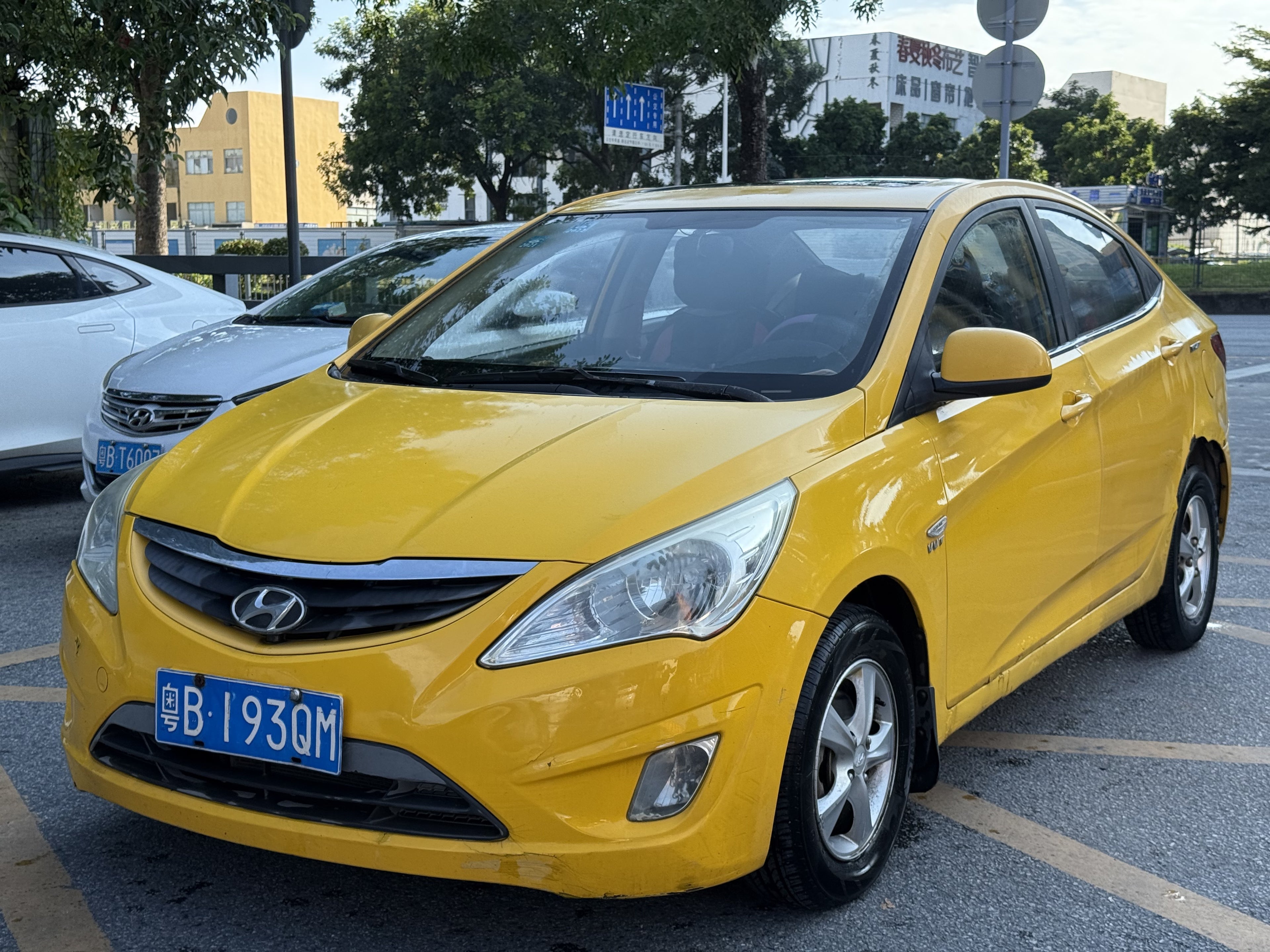 2010 Hyundai Verna Yellow Sedan - Rear 3/4 View