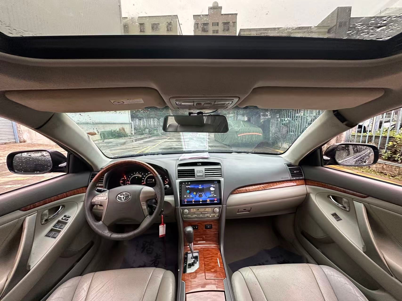 Toyota Camry 240G rear three-quarter view