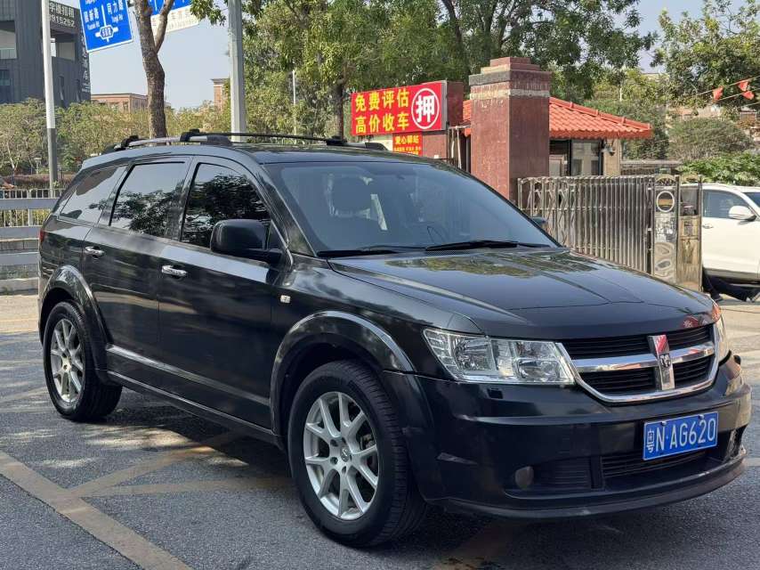 2010 Dodge Journey 2.7L Black SUV - Front View