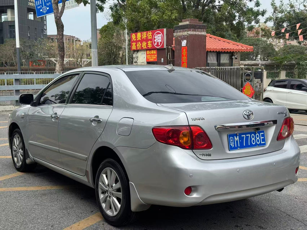 Toyota Corolla 2008 interior – beige leather seats and dashboard