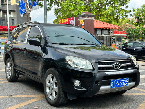2011 Toyota RAV4 black - rear three-quarter view