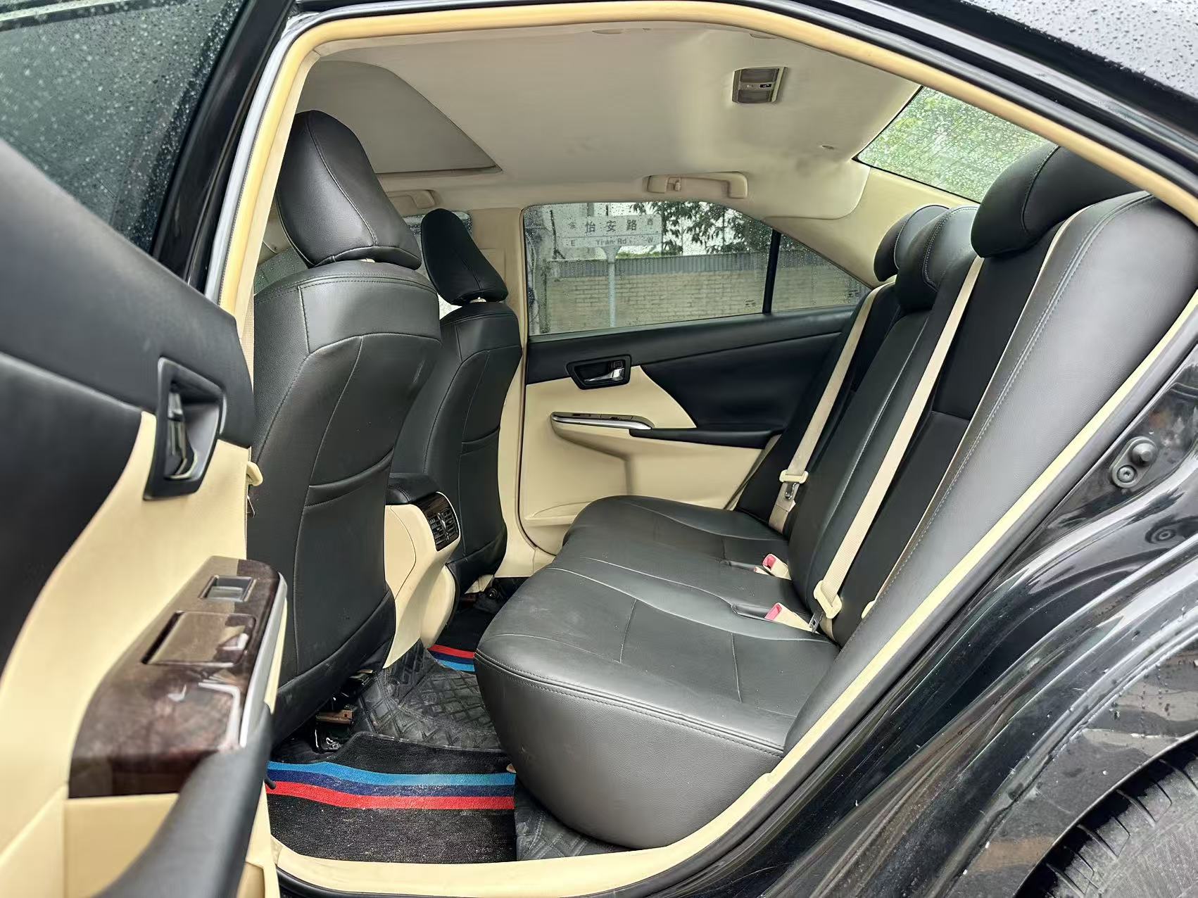 Toyota Camry rear three-quarter view at Lao Liu garage