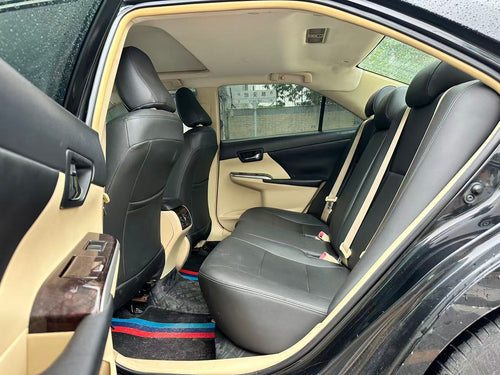 Toyota Camry rear three-quarter view at Lao Liu garage