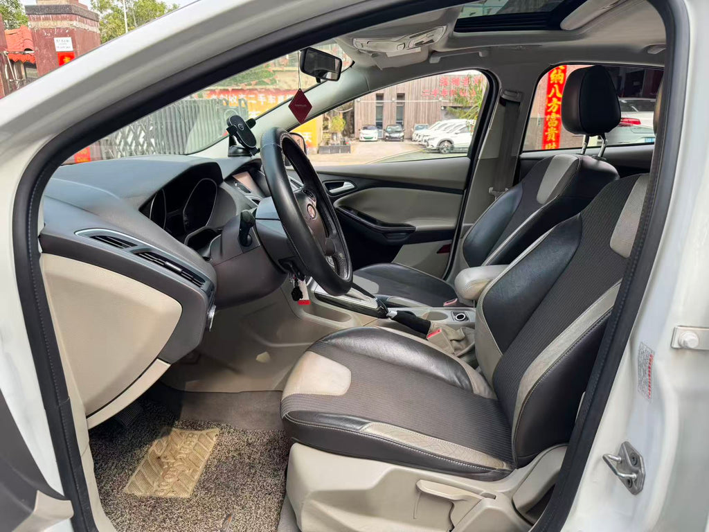 Ford Focus 2012 rear three-quarter view - white sedan export ready