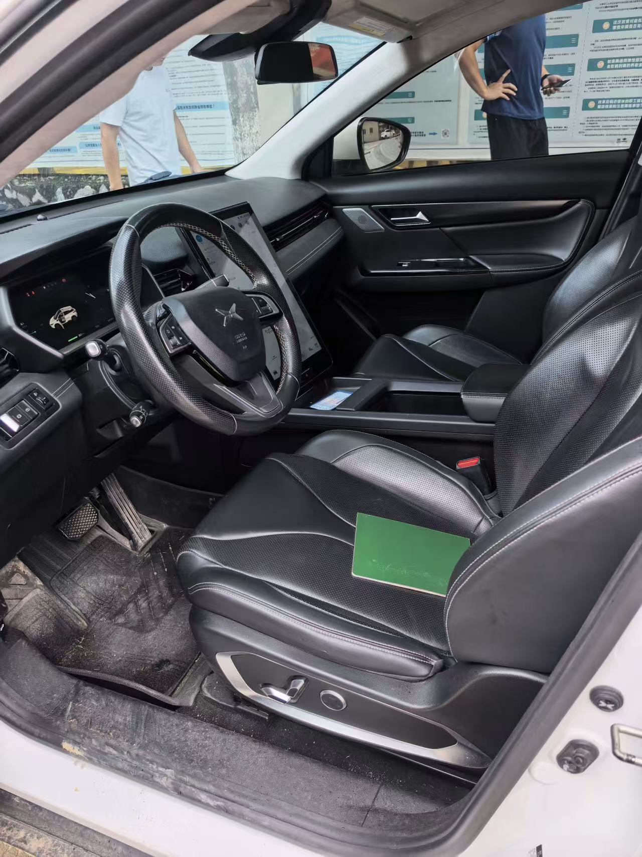 Xpeng G3 driver seat and dashboard interior view