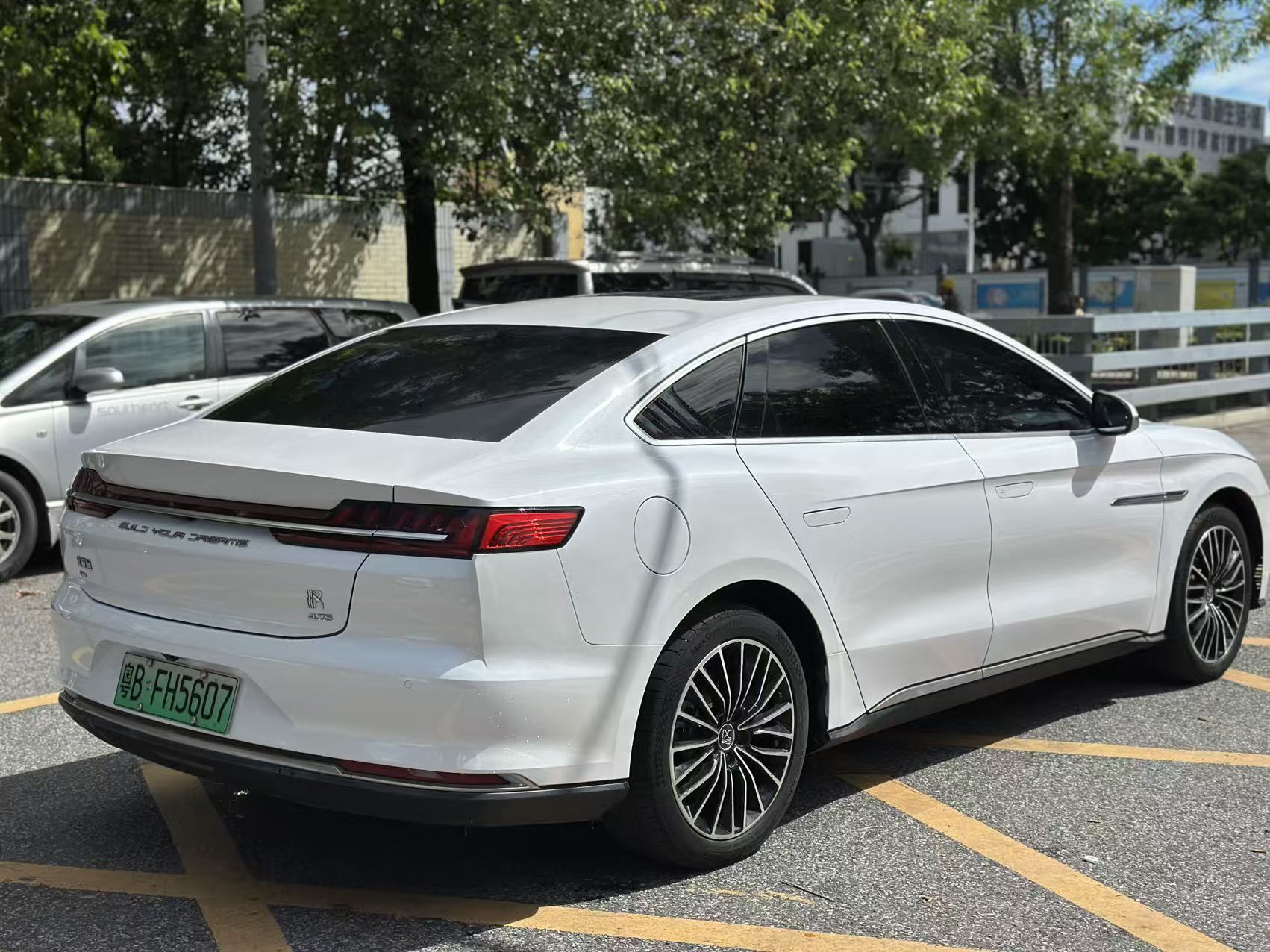 BYD Han DM rear three-quarter view, white exterior