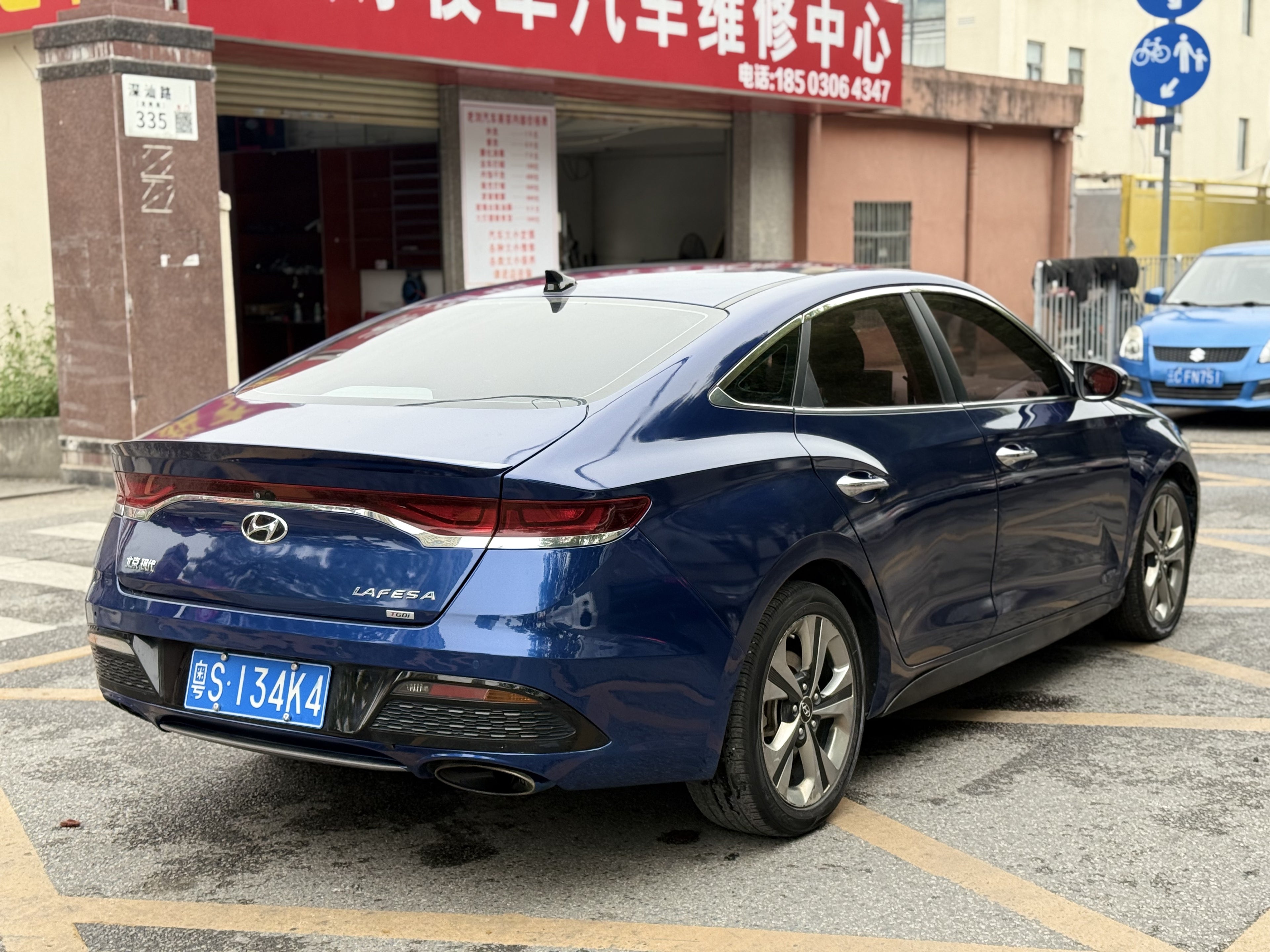 2019 Hyundai Lafesta 280TGDi Sport - Rear 3/4 view, blue
